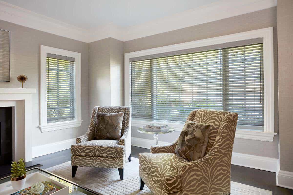 2 inches gray faux wood blinds inside mounted with valence upgrade in a modern living room