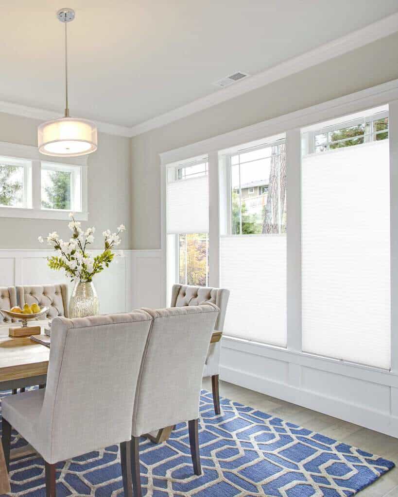 white cellular shades in dining room