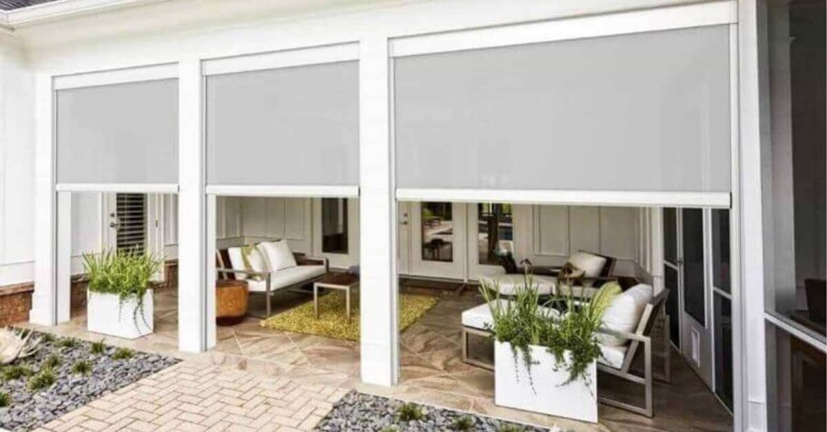 White exterior shades beautifully complementing the patio, adding style and functionality to outdoor spaces.
